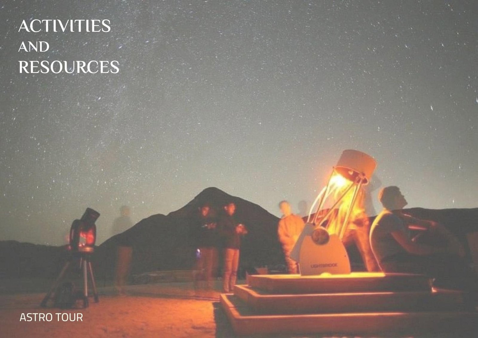 Astro-tour activity reference photograph with telescopes under a star-filled desert sky.