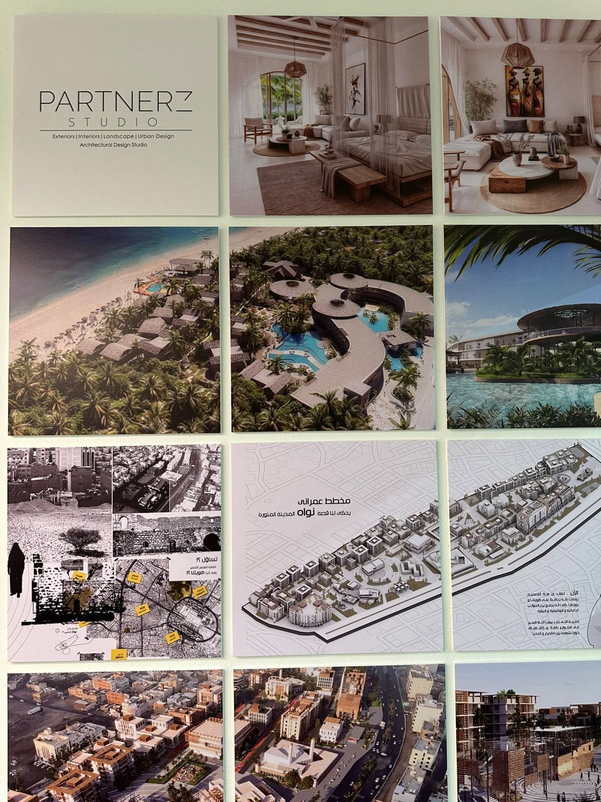 Close view of a Partnerz studio presentation wall with interior, resort, urban analysis, and architectural rendering sheets.